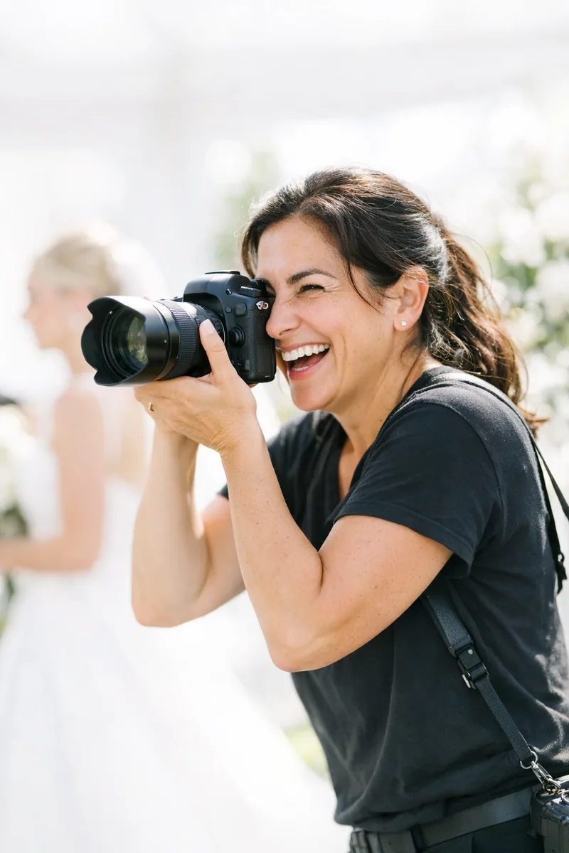 The photographer at work, camera raised